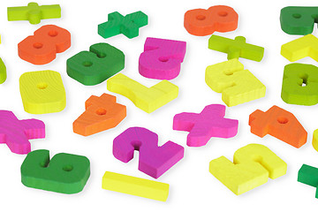 Image showing Multi-colored wooden toy figures on white