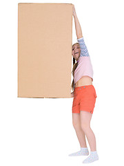 Image showing Small cheerful girl drags big cardboard box isolated on white