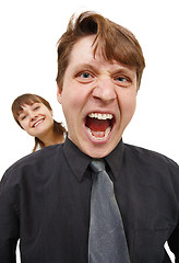 Image showing Man in rage and shouted loudly. Woman happy.