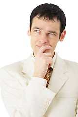 Image showing Man in business suit intently thinking