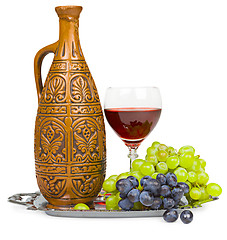 Image showing Still life - clay jug, glass of wine and grapes