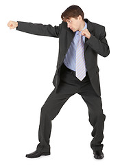 Image showing Man in black suit, punching