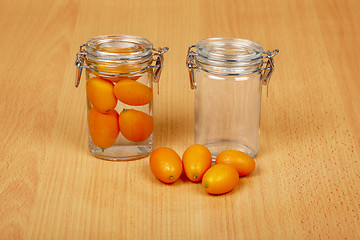 Image showing Production of exotic citrus fruits canned