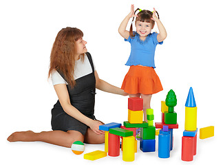Image showing Mother and daughter playing with color blocks