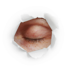 Image showing Closed eye in hole