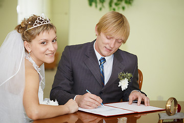 Image showing Registration of marriage. Happy newlyweds.