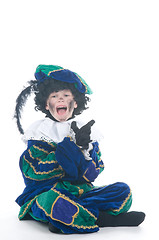 Image showing Child playing Zwarte Piet or Black Pete