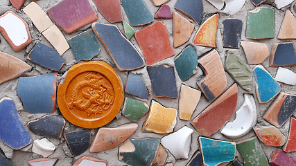 Image showing Wall made of pottery pieces