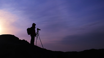 Image showing Photographer at sunrise