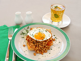 Image showing Egg On Baked Beans