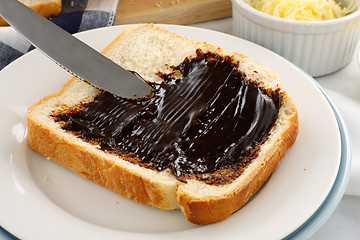 Image showing Spreading Vegemite