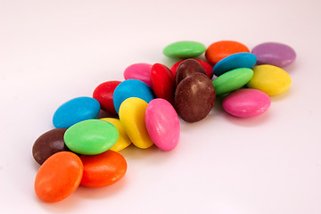 Image showing row of coloured candy buttons