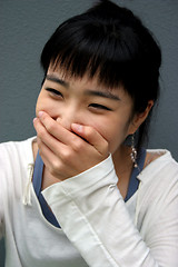 Image showing Laughing her head off