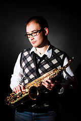 Image showing man and saxophone