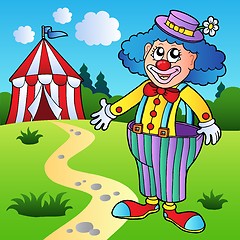 Image showing Clown in big pants with circus tent