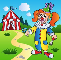 Image showing Cartoon clown girl with circus tent