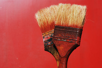 Image showing dirty paintbrushes