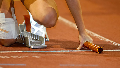 Image showing Relay runner in the starting blocks