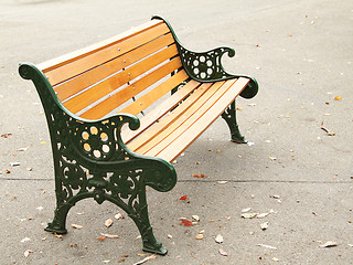 Image showing An orange bench