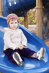 Image showing Toddler girl on slider