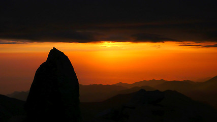 Image showing Sunrise at the top of mountains