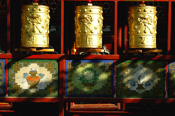 Image showing Golden prayer wheels in Tibet