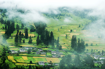 Image showing Mountain village in a misty morning