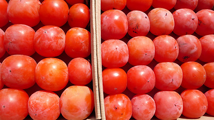 Image showing Red Persimmon fruits in autumn