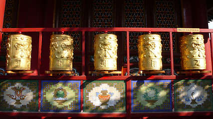 Image showing Golden prayer wheels in Tibet