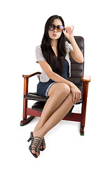Image showing beautiful woman in a rocking chair 