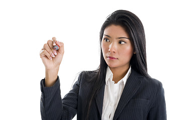 Image showing businesswoman writing with a red marker