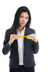 Image showing business woman with ruler 