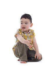 Image showing boy sitting on the floor