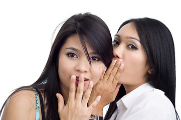 Image showing woman telling her friend a secret