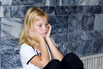 Image showing blond girl with bad mood
