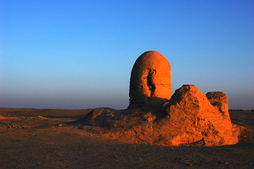 Image showing Relics of an ancient castle in the desert at sunrise