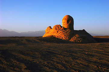 Image showing Relics of an ancient castle in the desert at sunrise