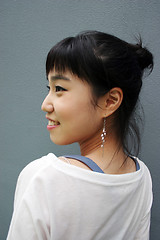 Image showing Attractive young Korean woman with her head turned