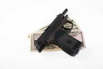 Image showing Pistol and dollars