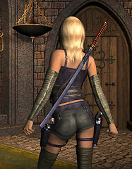 Image showing armed young woman from behind