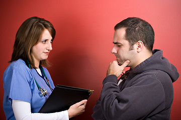 Image showing Man Talking To The Doctor