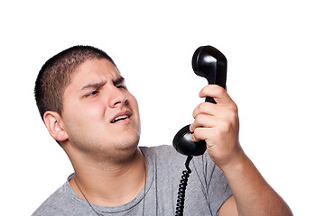 Image showing Man Screaming Into the Telephone