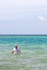 Image showing Senior Citizen Snorkeling in Tropical Waters