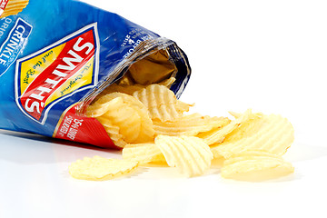 Image showing Opened packet potato crisps