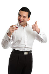 Image showing Happy man thumbs up wine