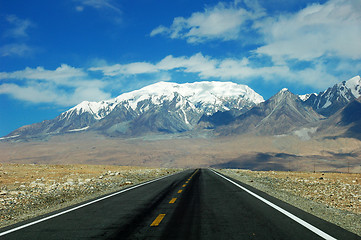 Image showing Highway towards snow mountains