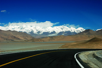 Image showing Highway towards snow mountains
