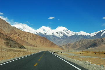 Image showing Highway towards snow mountains