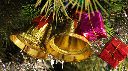 Image showing Christmas bells in the tree