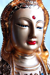 Image showing Closeup view of a golden buddha statue